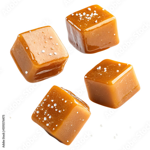 Salted caramel cubes floating in mid air concept. Delicious caramel cubes sprinkled with sea salt, perfect treat.