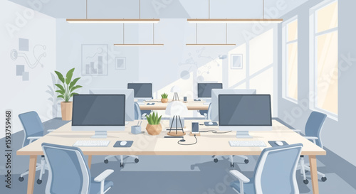 Bright office space showcases neat desks and modern computer equipment in a light filled and spacious contemporary work environment.