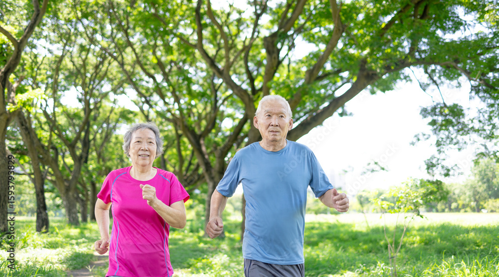 Fototapeta premium Happy Asian Senior couple running outdoor