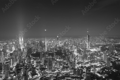 Canvas Print first light of dawn breaks over Kuala Lumpur