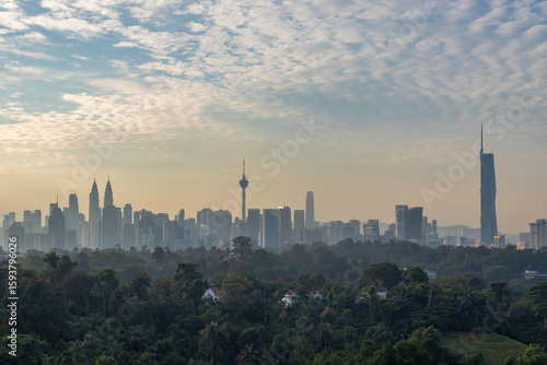 Photography first light of dawn breaks over Kuala Lumpur