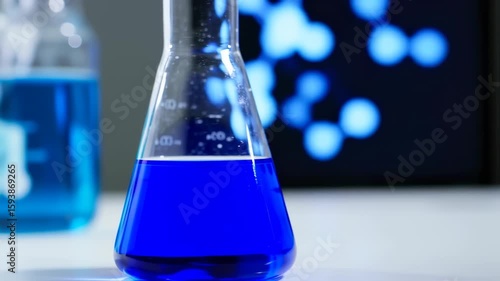 Blue Liquid in Flask: Scientific Research and Molecular Visualization