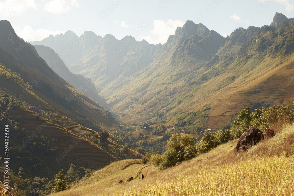 Naklejka premium Mountain valley vista, golden hues