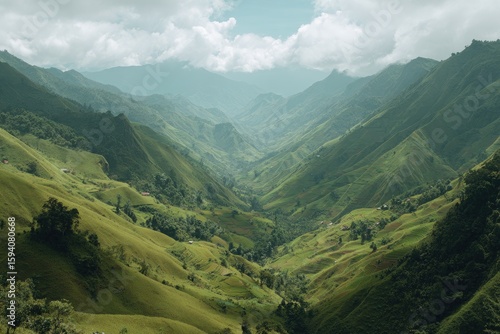 Lush valley nestled amongst towering green mountains