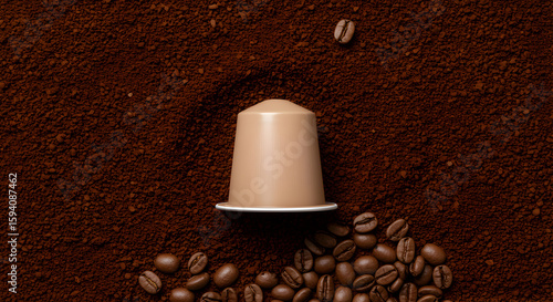 Single Coffee Pod Nestled in Ground Coffee Beans