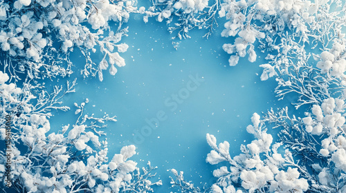 Aerial view of a serene winter landscape blanketed in white and blue snow tones. Trees, fields, and terrain are softly textured by frost, evoking calm, purity, and seasonal stillness.
