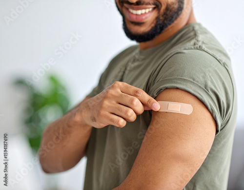 Hand Placing Wound Plaster on Arm: Personal Care Action for Skin Protection, First Aid Treatment for Minor Injury, Healthcare Concept, Medical Attention, Human Hand Close-Up