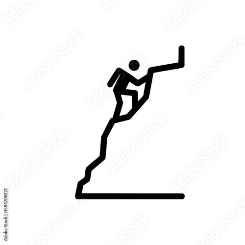 Silhouette of a person climbing a steep rock face with a flat top and a vertical extension at the summit