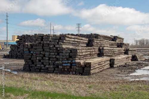Old cull mats or timber mats used for temporary road access, ground stabilization, or heavy equipment.