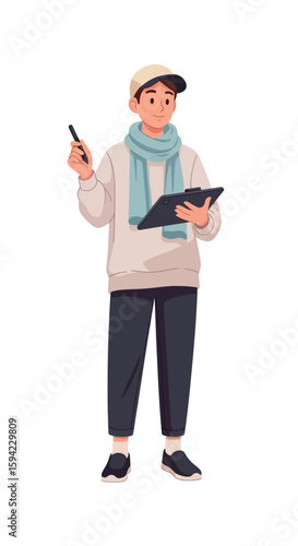 Male Graphic Designer at Workstation Holding Tablet
