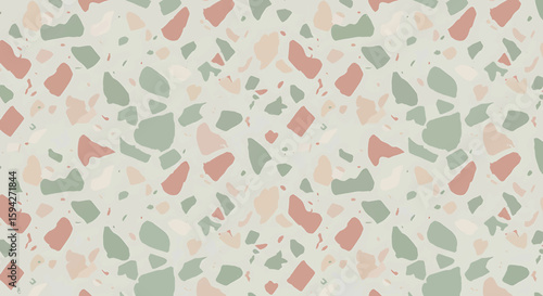 Terrazzo pattern with scattered fragments in shades of pink, green, and beige on a light background, creating a textured, decorative surface.