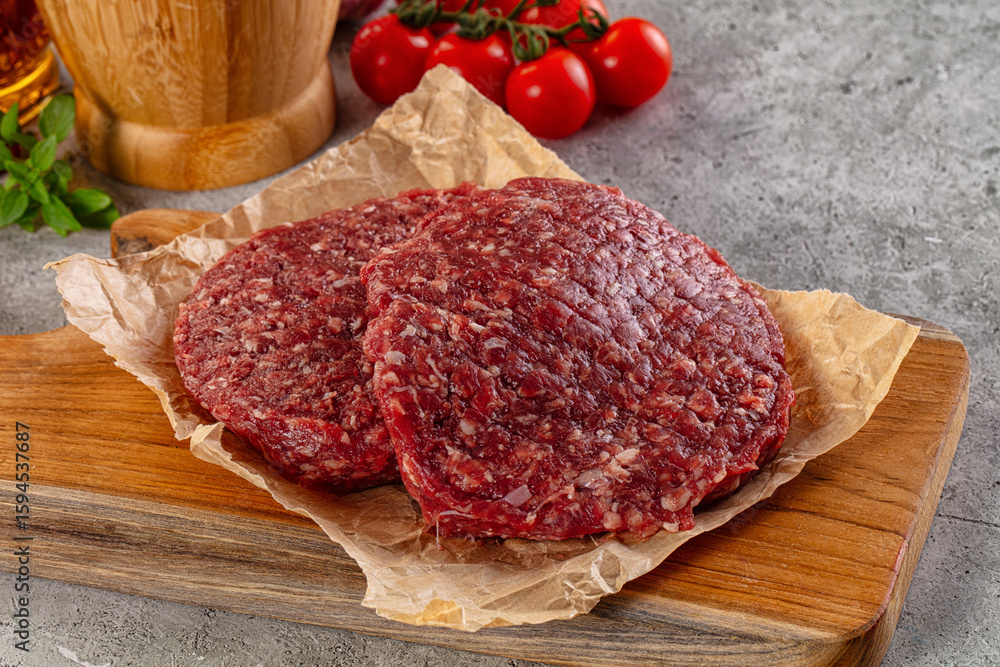 Raw beef burger cutlet for grill Raw beef burger cutlet for grill
