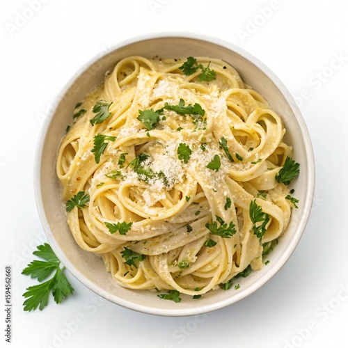 Delicious creamy fettuccine alfredo pasta with parsley and parmesan cheese