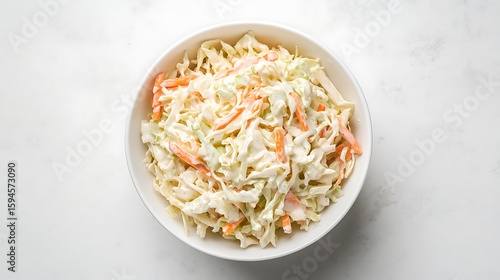 Fresh Coleslaw in a White Bowl on a Light Surface