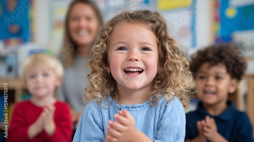 Nursery children playing with teacher in the classroom 53790018 1