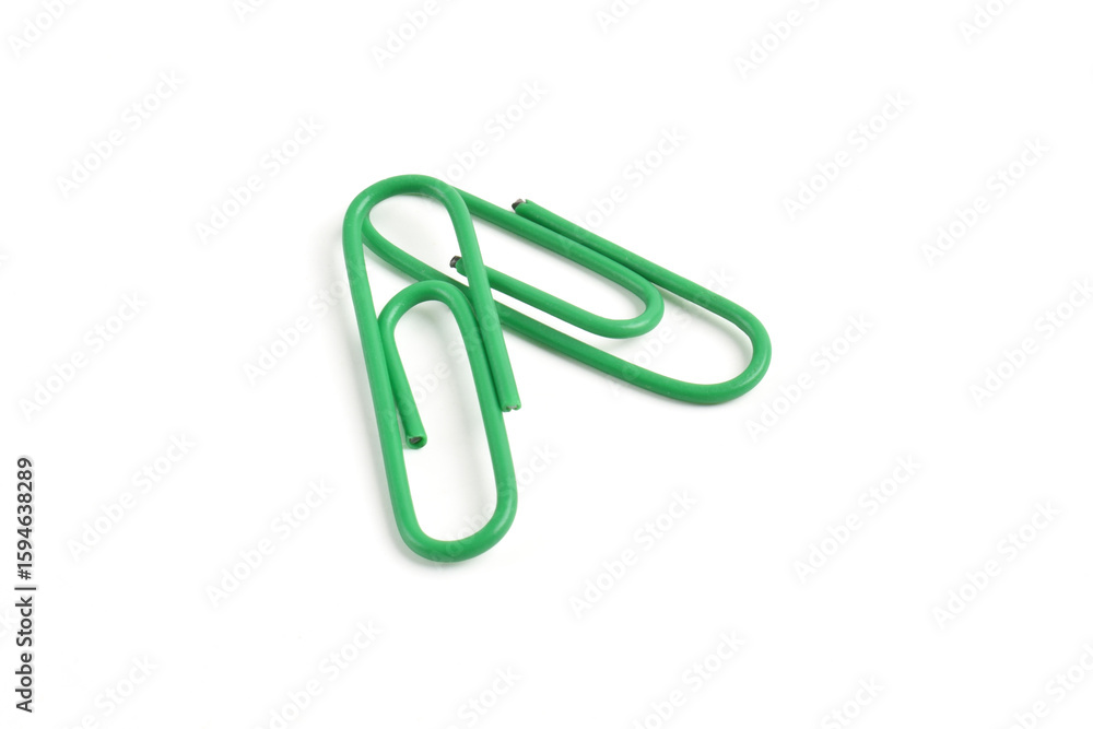 Two green paper clips isolated on white background Two green paper clips isolated on white background