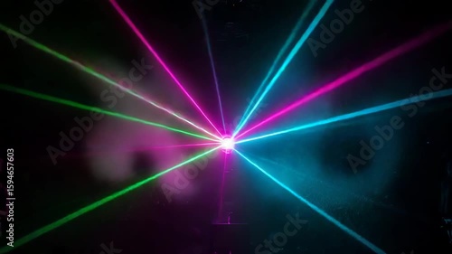 Vibrant Multicolor Laser Show with Radiating Beams and Particles in Energetic Club Atmosphere