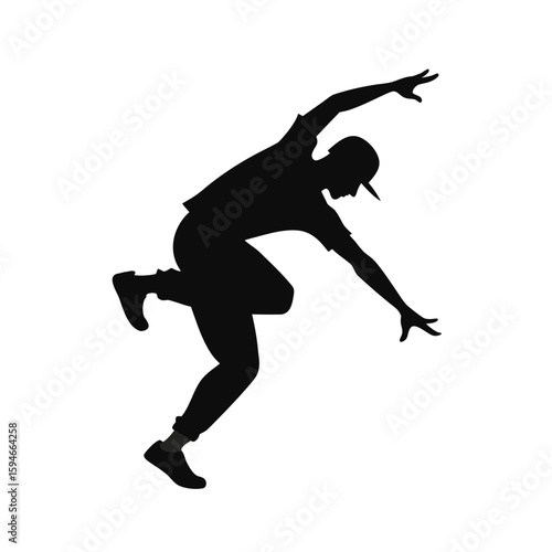 Dynamic silhouette of a solo street dancer in action
