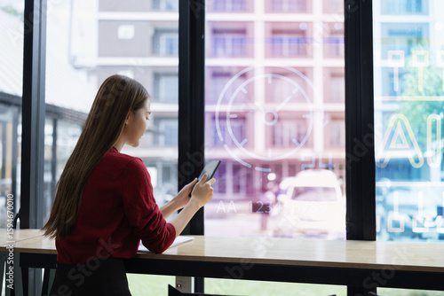 Happy young Asian businesswoman using digital smartphone sitting in office. Free Download Happy young Asian businesswoman using digital smartphone sitting in office. - GFXLoad