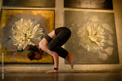 Wallpaper Mural Young woman practicing yoga poses in an art gallery space, combining wellness and creativity. Mindful lifestyle, body awareness, and harmony in modern cultural environment Torontodigital.ca