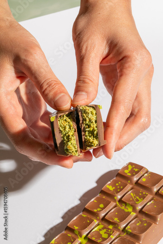 Bild auf Leinwand Indulge in creamy pistachio-filled dubai chocolate harmony, sweet tooth dreams,