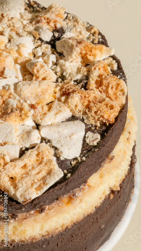 Golden-honeycomb topped chocolate cake whispers autumn equinox indulgence and cozy Hygge vibes in a deliciously textured panorama