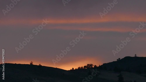 Wallpaper Mural Silhouette of a mountain and trees against the background of a  sunset sky and clouds. Torontodigital.ca