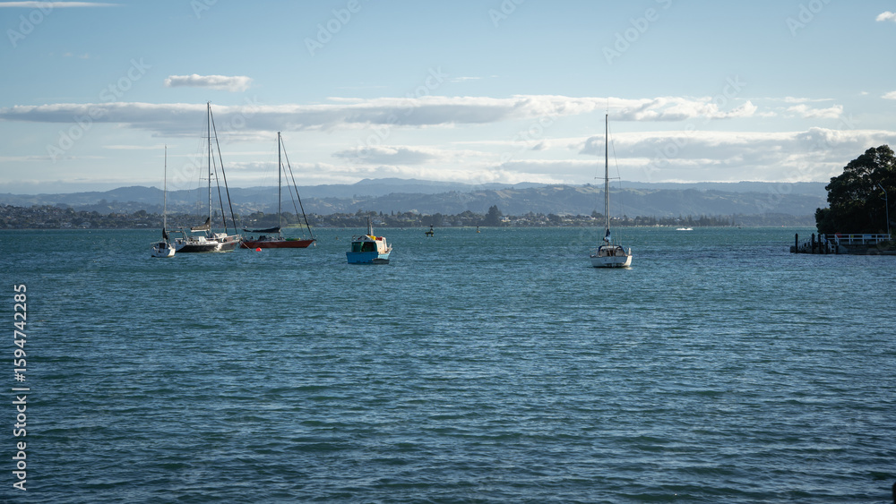 Marine landscape with boats on a sea, water surface, Tauranga, New Zealand Marine landscape with boats on a sea, water surface, Tauranga, New Zealand
