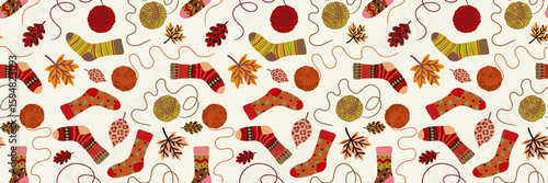 seamless pattern with cozy socks yarn balls autumn leaves and strings in warm fall colors on light background