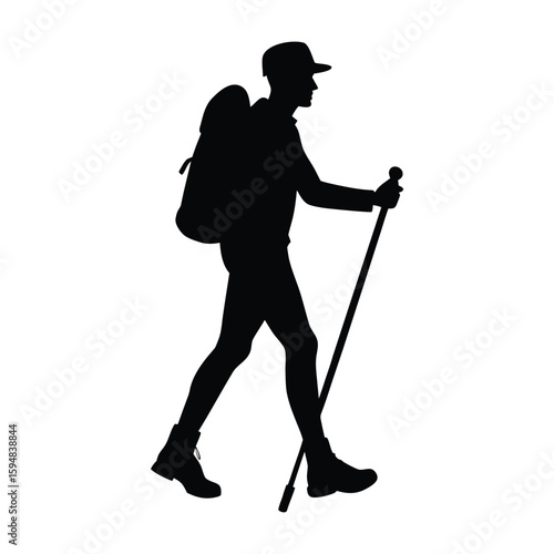 Silhouette of a hiker with a backpack and trekking pole walking