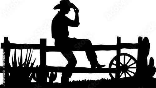 Silhouette of cowboy sitting on a fence with hand on hat next to wagon wheel and desert plants scene