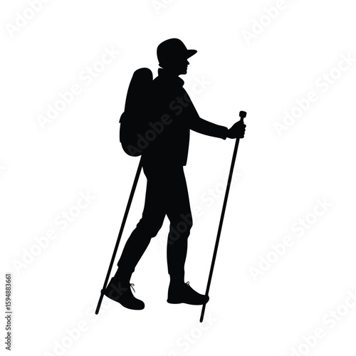 Silhouette of a hiker with trekking poles