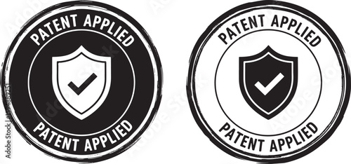 Black shield with checkmark and patent applied text, patent applied, shield, checkmark, protection, legal, intellectual property, trademark, copyright, innovation, invention, approval, certification, 