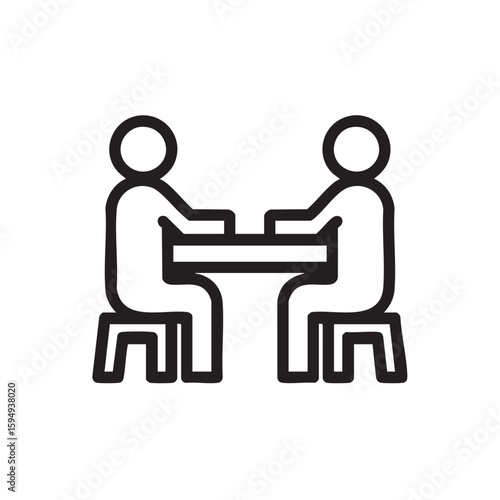 A simple black and white icon of two people sitting at a table.