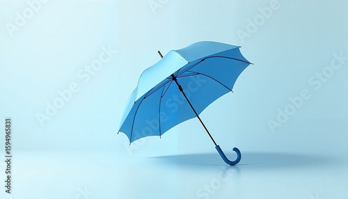 Wallpaper Mural Blue umbrella standing upright on minimalistic blue background   Torontodigital.ca