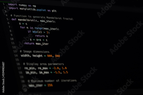 Python Code Dark Theme IDE on Monitor Screen