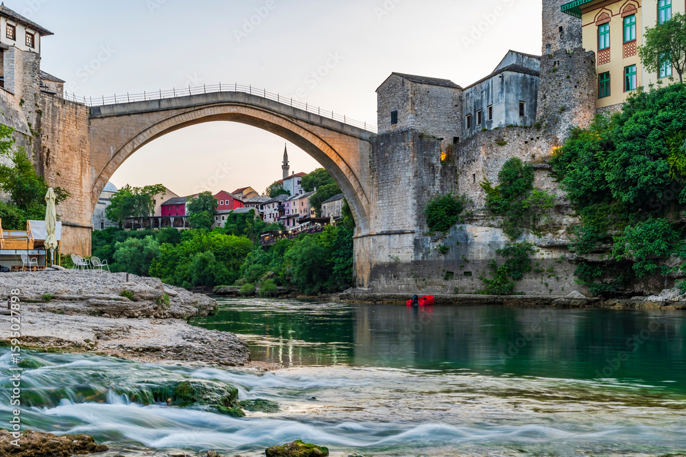 Fototapeta premium View of Mostar's Old Town with it's iconic Stari Most (Old Bridge) and River Neretva in Bosnia-Herzegovina