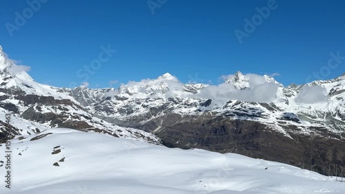 Wallpaper Mural Snow-Crowned Peaks Under Azure Skies Torontodigital.ca