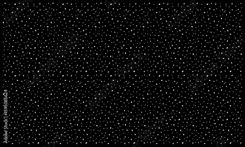 ランダムに散りばめられた手描き風ドットの黒背景パターン