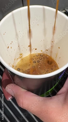 pouring milk into a cup