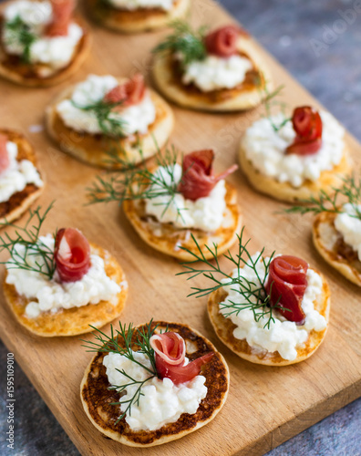 Photos Easy blini. Russian pancake with cheese and serrano ham