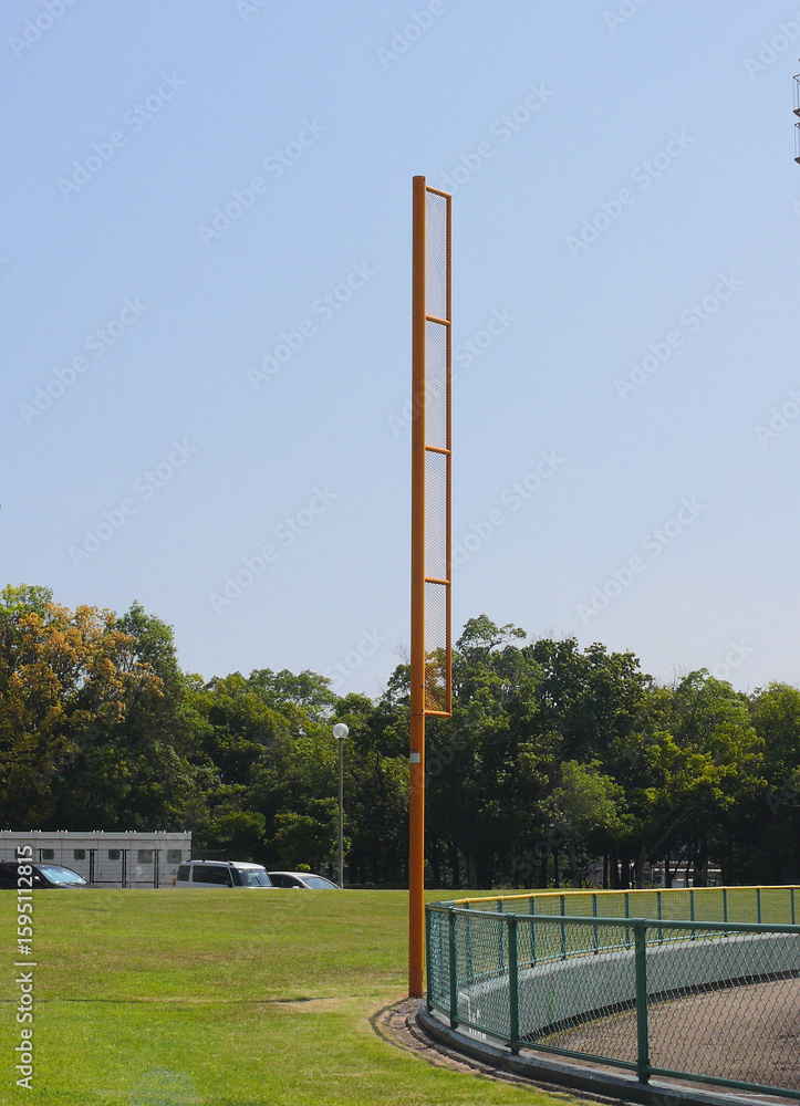 Fototapeta premium The foul pole in the baseball stadium inside the sports park.