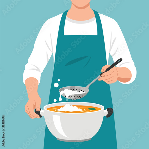 Person Skimming Foam From Cooking Pot with Slotted Spoon in Kitchen