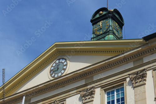an old clock on a historic building