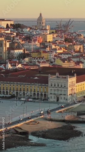 Wallpaper Mural Aerial vertical morning shot of Lisbon city center, Portugal. Explore vibrant Lisbon at sunset with stunning views of the historic architecture reflecting warm golden tones across the cityscape  Torontodigital.ca