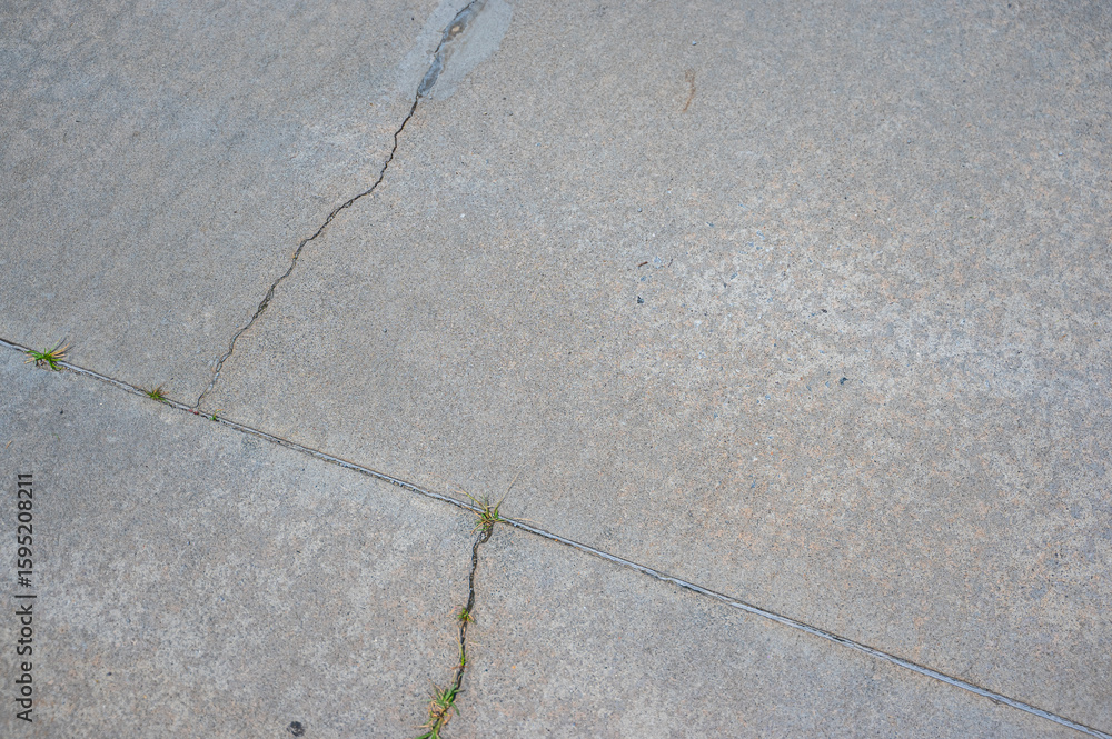 Obraz premium Even the hardest surfaces show their scars—every crack tells a story, Norcross, Georgia, United States of America