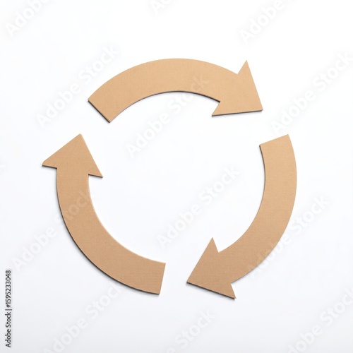 A round cardboard disc featuring a precise arrow cutout in the center, showcasing a rustic texture and a natural brown hue, perfect for crafts.