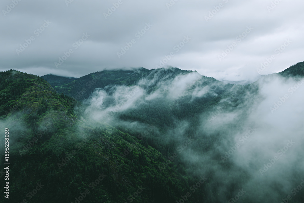 Mist-Shrouded Mountains Serene Landscape of Green Peaks and Ethereal Cloud Formations Above Mist-Shrouded Mountains Serene Landscape of Green Peaks and Ethereal Cloud Formations Above