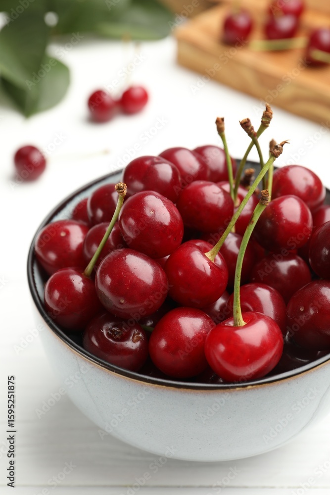 Fresh ripe cherries on white wooden table, closeup Fresh ripe cherries on white wooden table, closeup