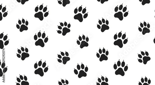 Seamless Pattern of Animal Paw Prints in Black and White